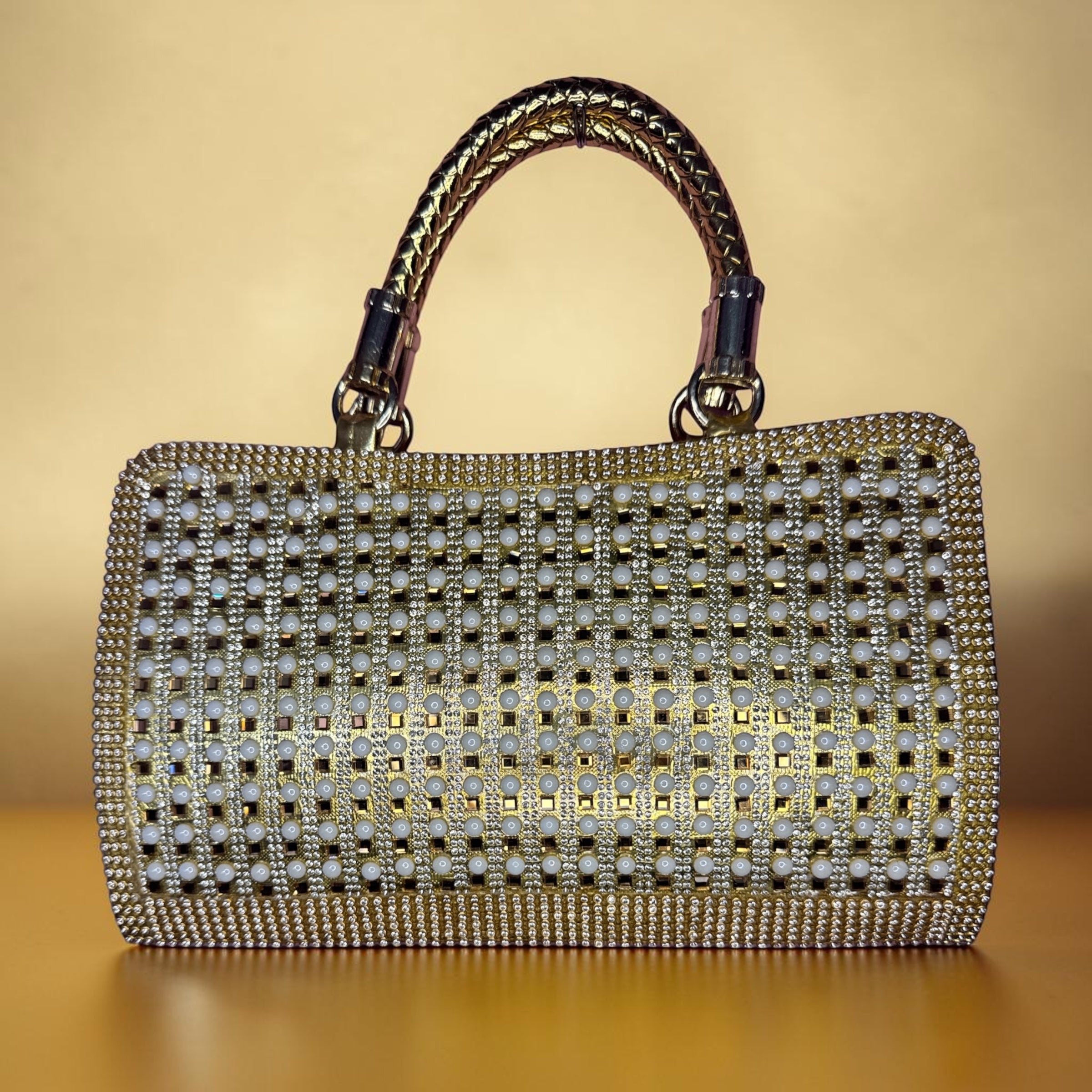 GOLDEN AND WHITE STONEWORK HANDHELD EVENING BAG
