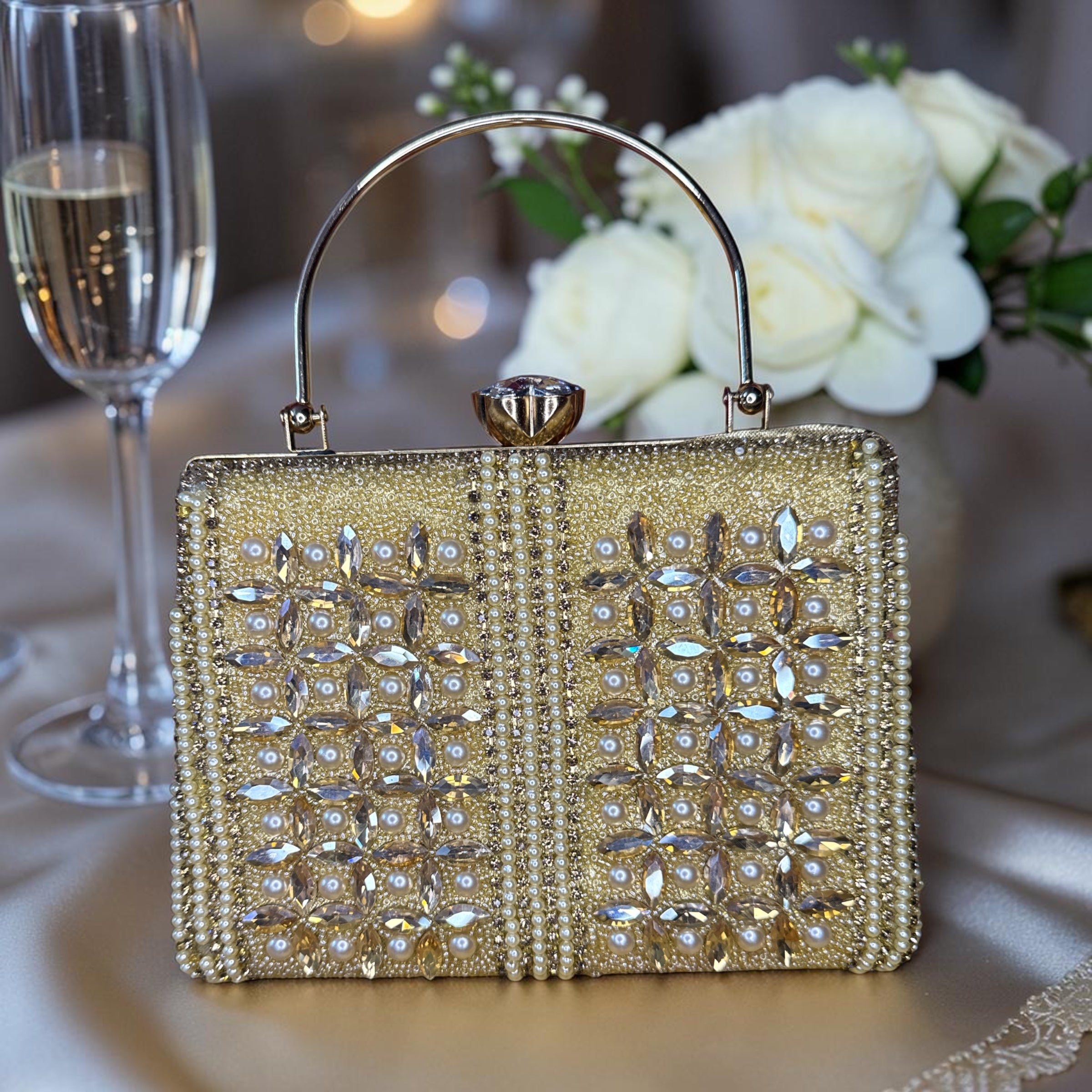 RHINESTONE AND PEARLS WORKED CLUTCH
